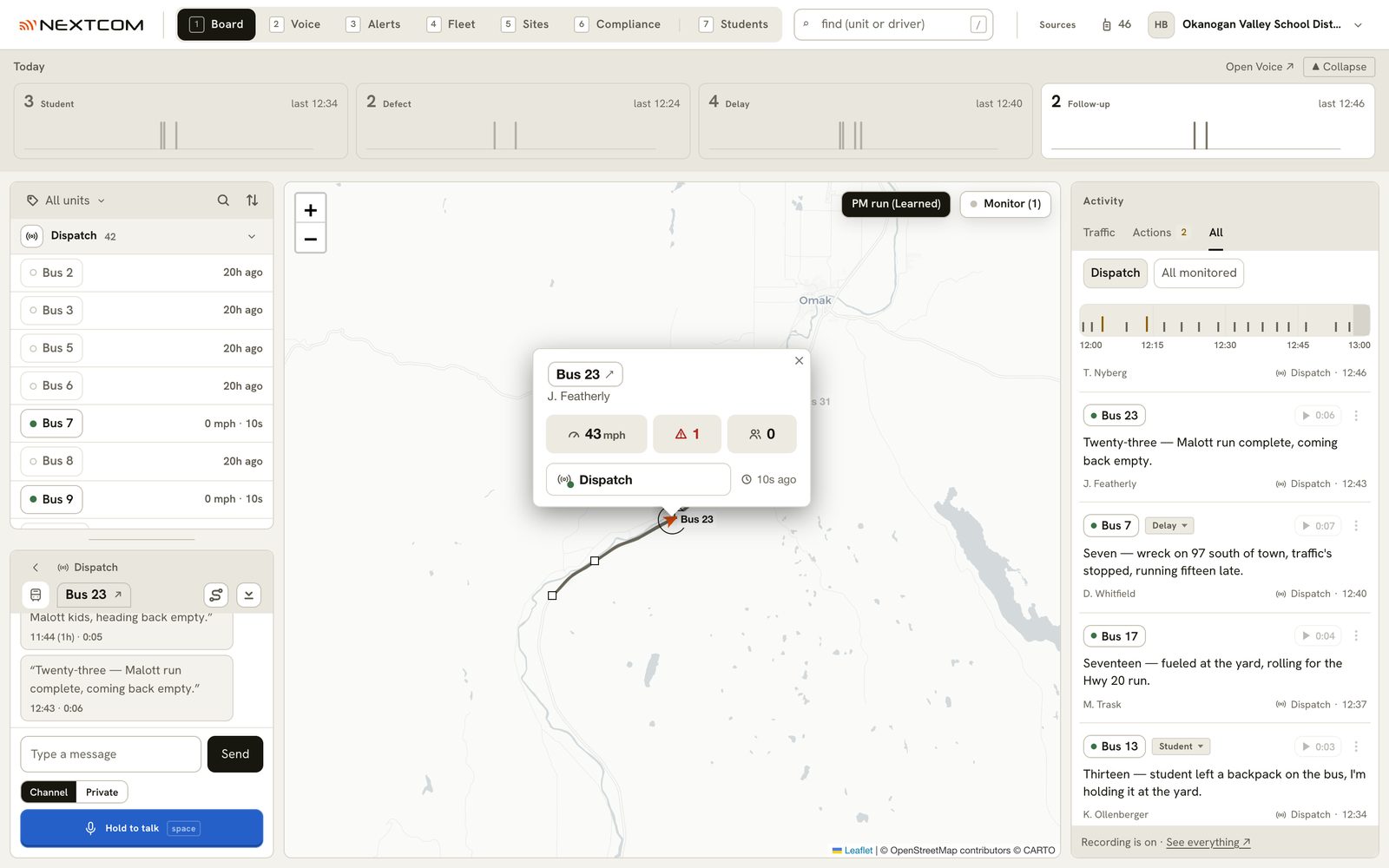 The dispatcher's screen: the fleet on a map, with radio calls transcribed beside it